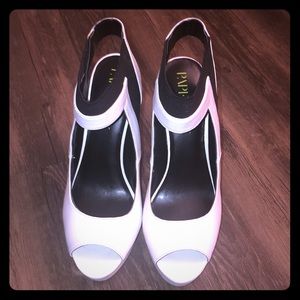 Women’s white and black heels